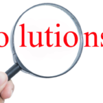 Hand holding a magnifying glass focusing on "Solutions" in bold red text for HVAC and home improvement insights.