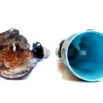 Blue cup and textured driftwood showcase nature and man-made elements for home efficiency enhancements.